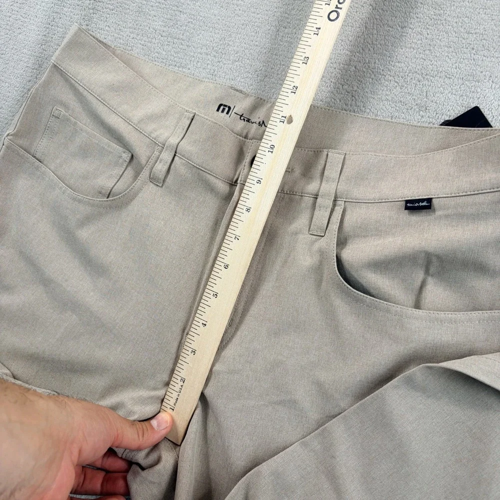 Travis Mathew Open to Close Golf Performance Pants in Khaki Men 34x32 Tag 33 NWT